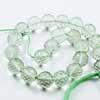 Natural Green Amethyst Faceted Round Beads Strand Length 9 inches and Sizes from 10mm to 12.5mm approx.Pronounced AM-eth-ist, this lovely amethyst comes in different colours from shades between purple to pink and green. Beautifully handcut. Amethyst is a variety of Quartz gemstone. This gemstone is 100% Natural earthmined. 